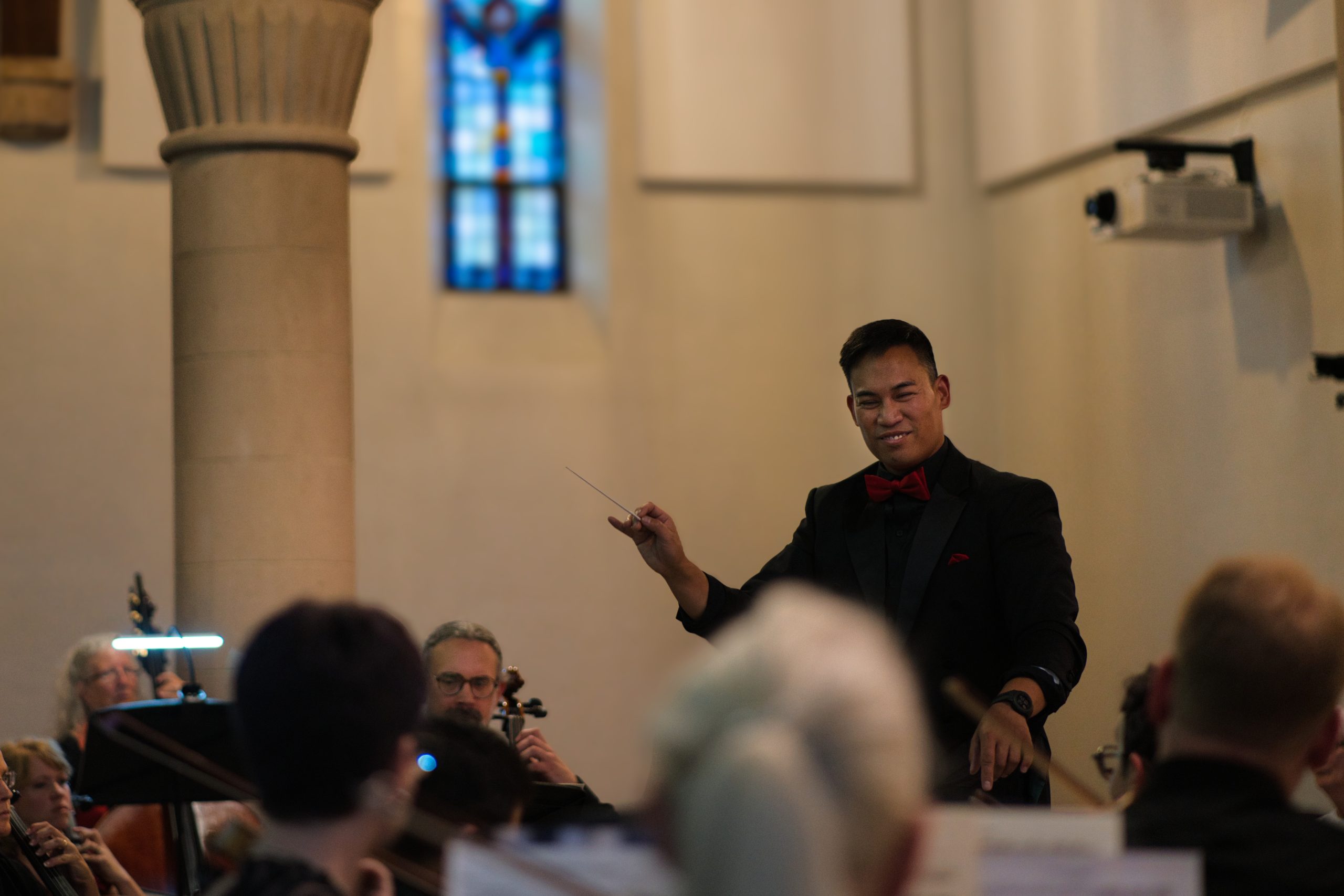 Dr. Alexander Magalong conducting Springs Camerata